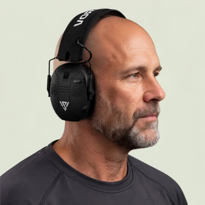VX1 PRO hearing protection worn by the model